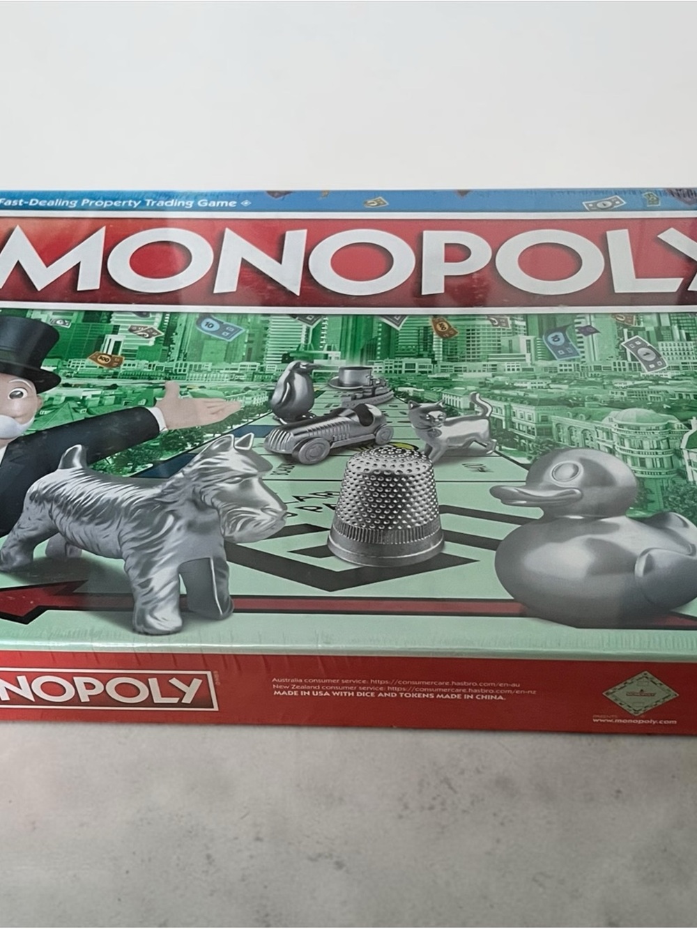 Hasbro Monopoly Game Box with Red, Green, Silver Artwork
